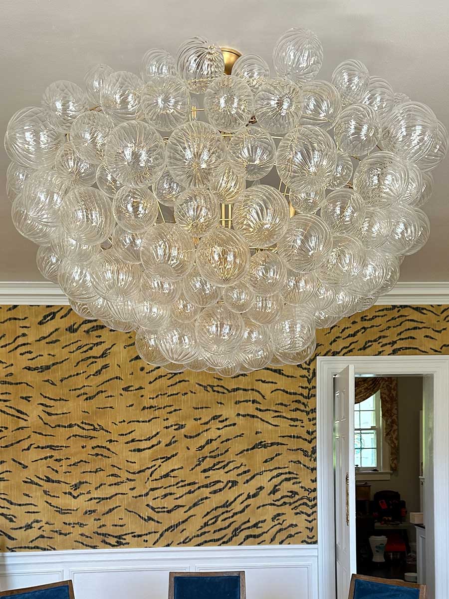 Dining room chandelier from Westchester County NY interior design project by The Red Shutters