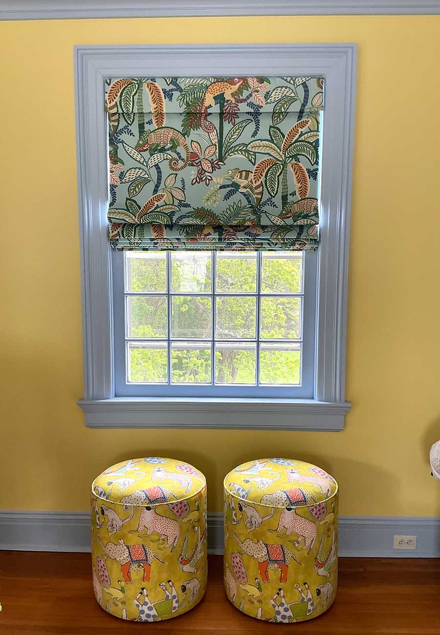 Jungle print roman shades and ottomans from Westchester County NY interior design project by The Red Shutters