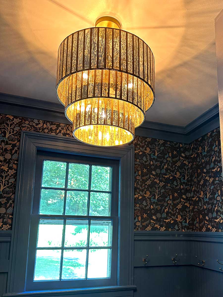 Mudroom chandelier from Westchester County NY interior design project by The Red Shutters