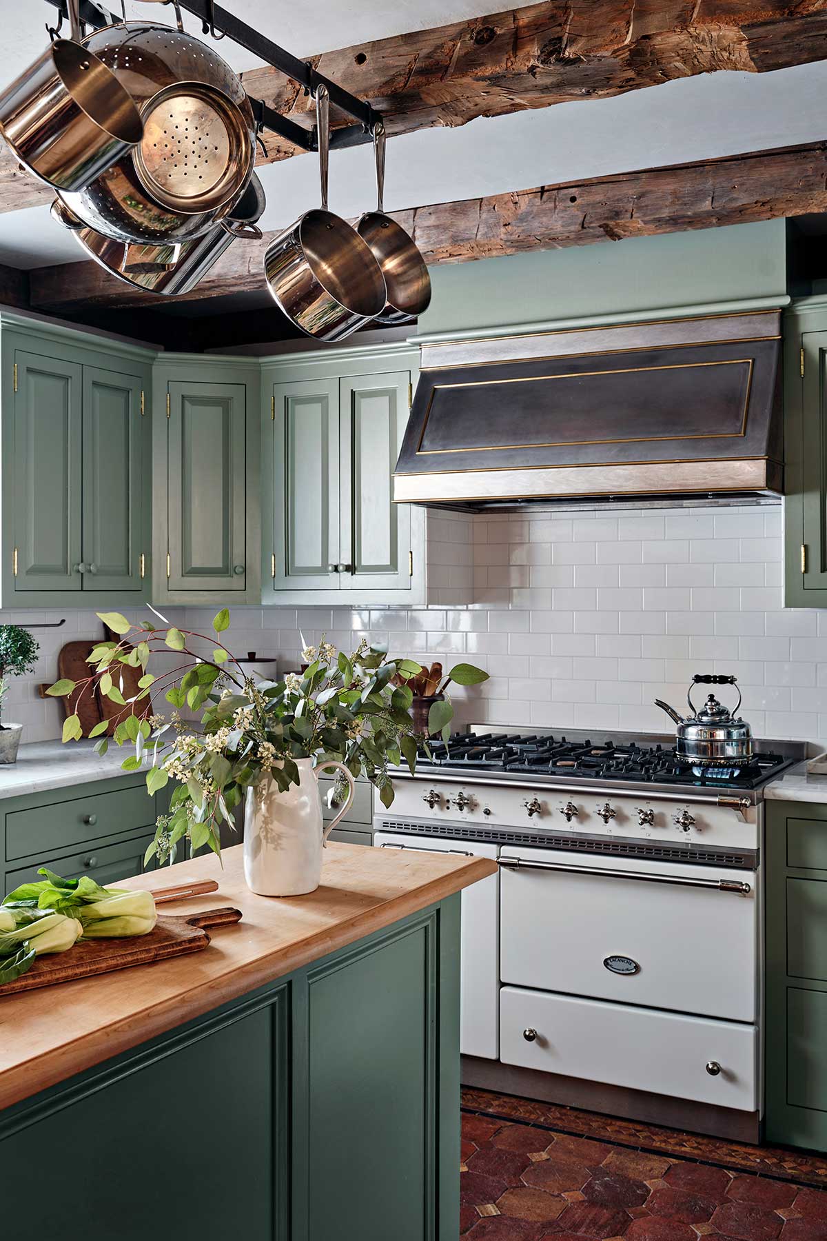 Kitchen-with-Rustic-Beams-and-Green-Cabinets--
