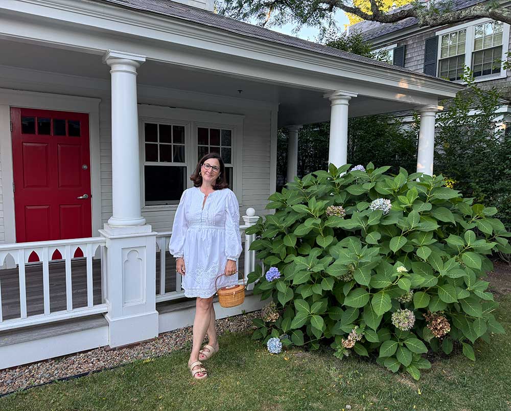 Interior Designer Marina Case Holding a Nantucket Friendship Basket